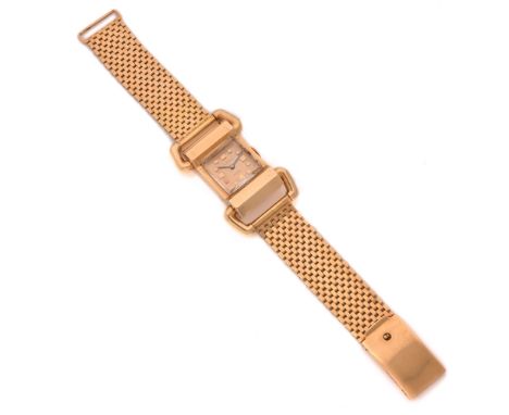 LEROY & FILSANNEES 40Montre bracelet en or jauneBOITIER: rectangulaire à larges attaches amovibles. Signé Leroy & Fils, 35, a