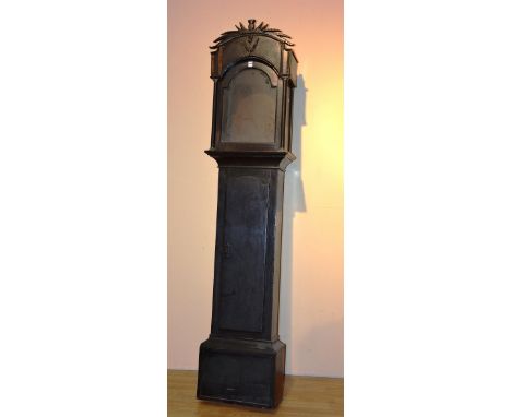 An 18th century ebonised Scottish longcase clock case, with carved thistle decoration to top of hood, above glazed door, 199c