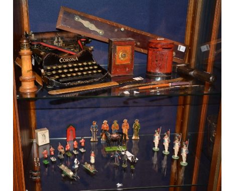 A small collection of vintage lead toy figures, to include guards playing instruments, nurses, policemen etc, together with a
