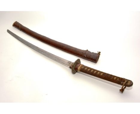 An early 20th century Japanese Katana, with shagreen and bound hilt, leather bound scabbard, blade 58cm long