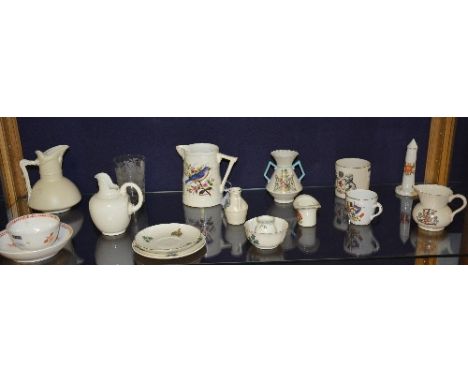 A mixed lot of 19th century and later porcelain, to include three Royal Worcester jugs, crested wares, tea bowl and saucer, a