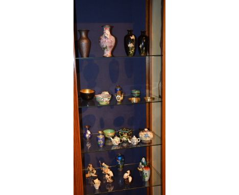 A collection of Oriental ceramic and cloissonne vases, together with Oriental ceramic figurines (a lot)