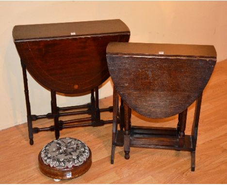 A Victorian walnut inlaid and beadwork circular footstool, of circular form, raised on ceramic castors, 34cm diameter, also w