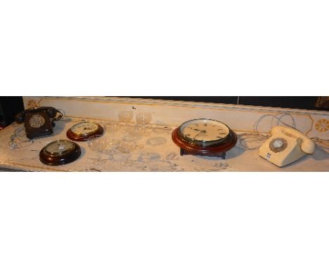 A mixed lot of sundry collectables, comprising of two Bakelite telephones, two modern wall clocks, barometer, and six champag
