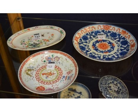 A Chinese famille rose pottery dish, decorated with birds in foliage, six orange character marks to base, 19.5cm diameter, al