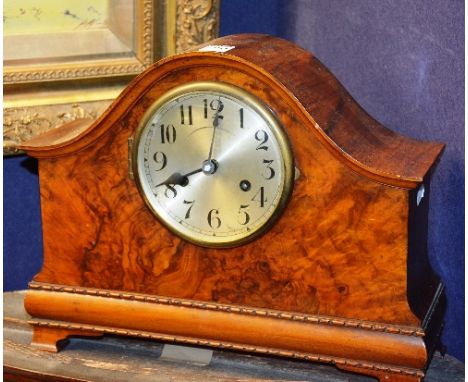 A vintage walnut cased mantel clock, the silvered dial with Arabic numerals, 29cm high
