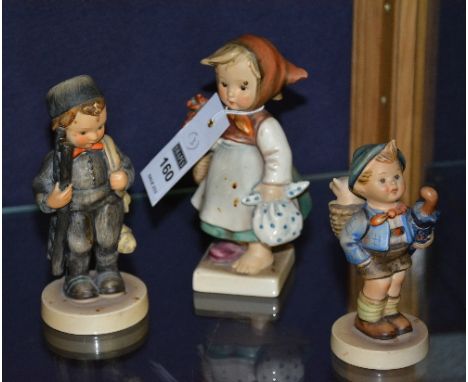 Three Hummel figures by Goebel, 12cm, 14cm, 15cm high