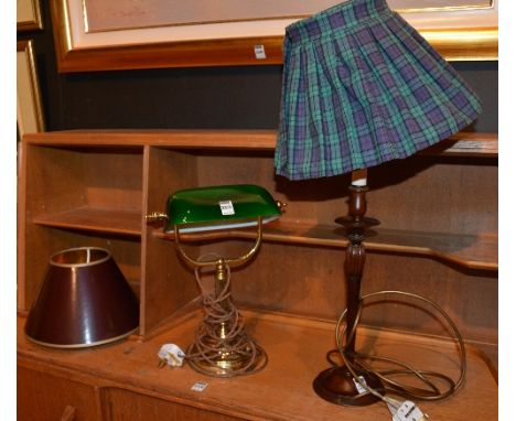 A modern desk lamp, with swivel green glass shade, 33cm high, also with fluted mahogany table lamp with shade, and spare shad