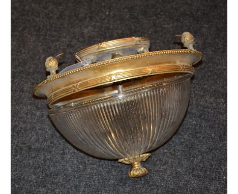 A gilt metal and glass ceiling light, with glass bowl and decorated with gilt pineapple finails, 28.5cm diameter