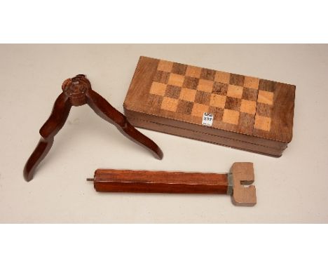 An early 20th century campaign travel chess board, with supports to interior, 8cm high x 38cm wide CONDITION REPORT: Lot 237 