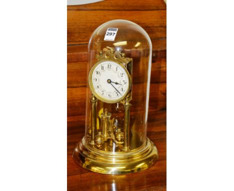 A German anniversary clock, with enamel dial and glass dome cover, 26cm high