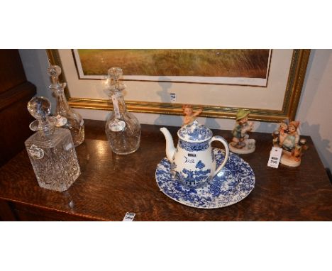 A mixed lot of porcelain and glass, to include three Hummel figures, three crystal decanters with ceramic spirit labels etc