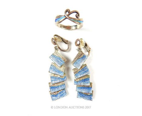 Contemporary handmade silver and enamel jewellery set by artisan jeweller Shelia Fleet, Orkney, Scotland, including a stylise