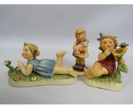 3 Exclusive edition Goebel Hummel figurines "Missbeehaving", "Sunflower Friends" And "Pig Tails". All come with boxes.