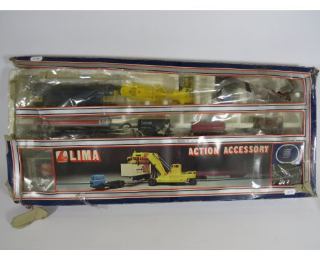 Lima 00 Scale Action accessory pack. Complete but with tatty original box. See photos. 