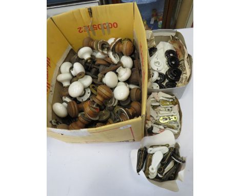 A large quantity of vintage ceramic enamel and wood door handles and fittings etc.