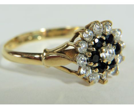 9ct CZ set Cluster ring. Finger size 'T-s' 2.4g