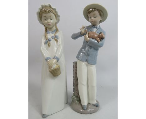 2 Nao figurines, Boy with a puppy and girl with basket. Approx 10" tall.