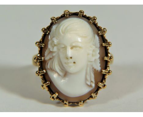 Large 9ct Yellow Gold Cameo set ring in a open pierced basket style mount.  Finger size 'P'   6.0