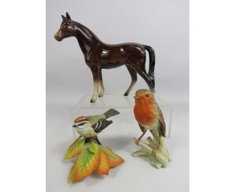 Mixed figurine lot to include a Goebel Robin, a Lenox bird and a continental horse.