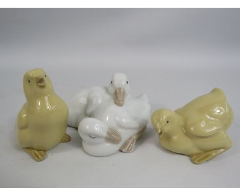 2 Nao chick figurines and one of two ducks.