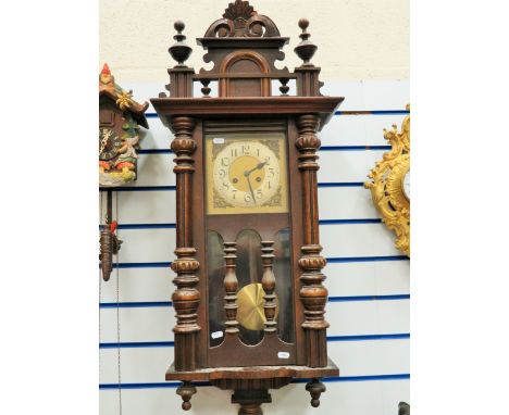 Early 20th Century  Oak Cased chiming wall clock with brass face. Runs well. Approx 38 x 16 inches. See photos. 