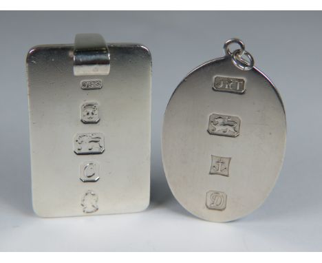 Pair of Silver Ingot pendants. See photos