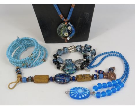 2 Artisan handmade lampwork glass necklaces and 3 bracelets. Some with sterling silver clasps.