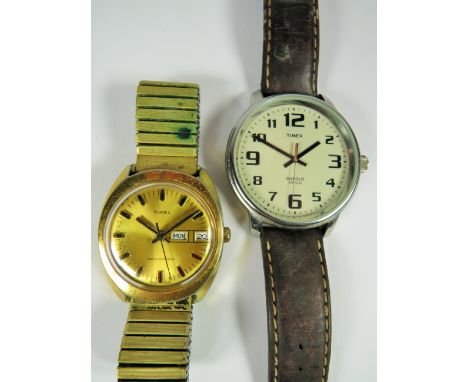 Timex quartz watch with leather strap, needs battery,  Timex Day Date mechanical 26962 watch, expanding strap. For repairs, s