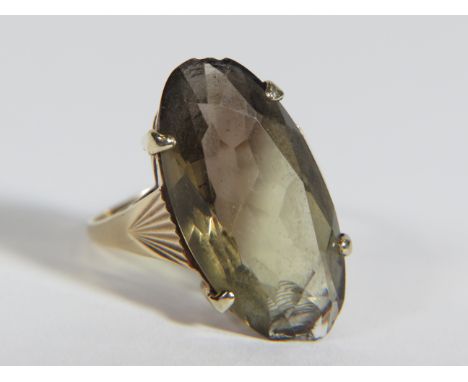 Large Smokey quartz ring in heavy 9ct Gold setting (some chips to quartz)   