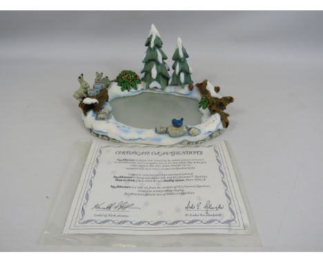 Goebel Hummel Icy Adventure base. Comes with Certificate and box.