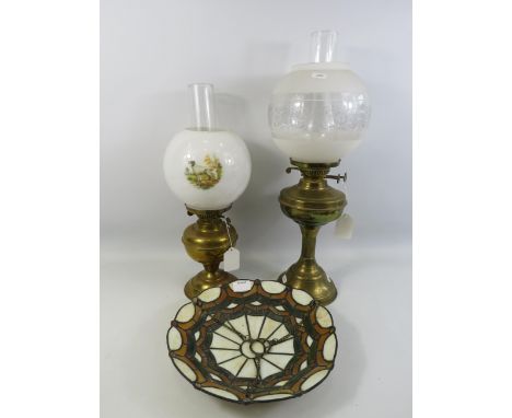 2 Vintage brass oil lamps and  a Tiffany style light shade.