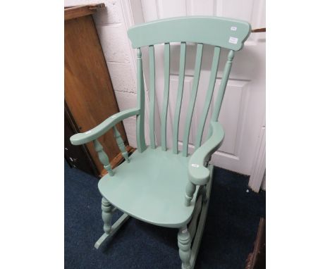 Nice quality curved stick back painted rocking chair in good order.   See photos.    S2