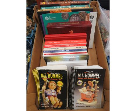 Box of books relating to collecting Hummel figurines and cigarette cards etc.