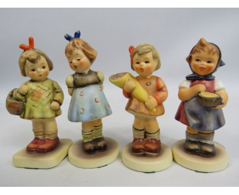 4 Small Goebel M I Hummel Club figurines "I Bought you a Gift", "Two Hands one treat", "From me to you" and "Sweet offering".