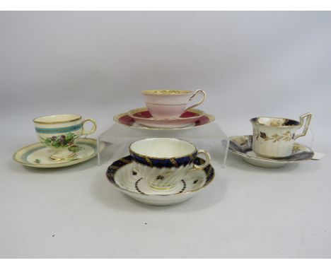 2 Early Royal Worcester cups and saucers plus 2 others.