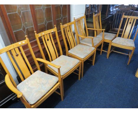 Blonde wood dining chair set by Ercol,  four diners plus two carvers.   See photos. 