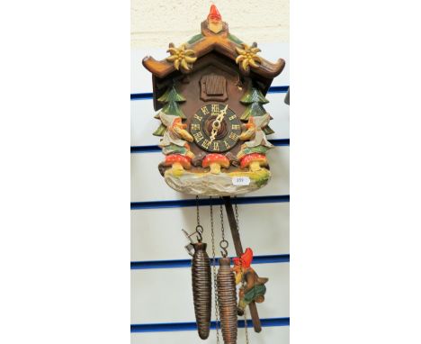 Black Forest style painted cuckoo clock in running order. See photos. 