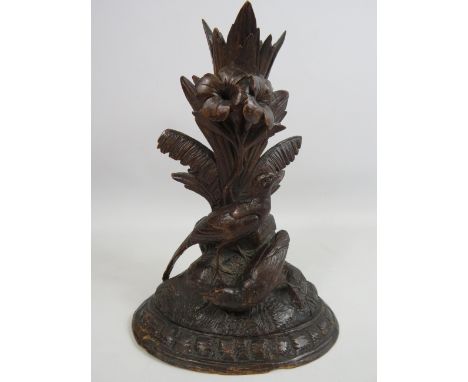 Vintage Black Forrest carved wooden candle stick decorated with birds and flowers. Approx 9" tall.