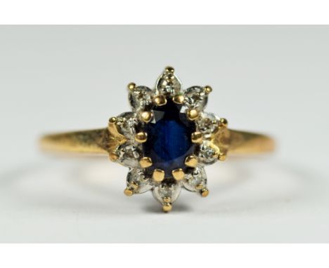 9ct white and yellow gold diamond and sapphire oval halo cluster dress ring (1.6g)     2041305