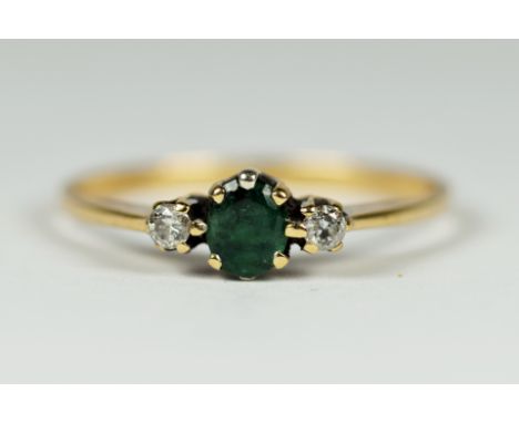 9ct yellow gold ring set with Clear and Green Gemstones.  Finger size 'S-5'  1.5g