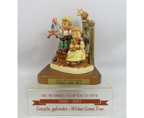 Goebel M I Hummel Club exclusive 2000 - 2001 figurine "Wishes do come true" stands on a wooden and base, comes with pespex po
