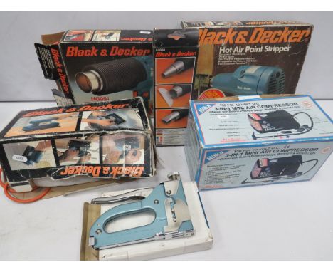 Selection of Black and Decker Hot Air Guns, paint strippers, Sander, air compressor, stapler. Most have original boxes. See p