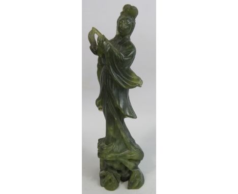 Vintage Chinese carved Jade figurine of a flute player approx 21cm tall.