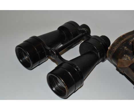 A pair of Ross London Military issue Prismatic No5 binoculars, black lacquered body, issue marks 1938 with arrow, complete wi