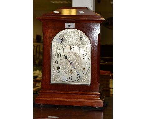An early twentieth century German mahogany bracket clock, with three winding holes, Chime/Silent aperture, Arabic numerals