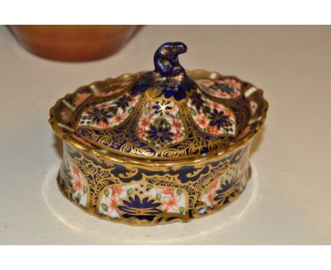 A Royal Crown Derby 1128 shaped oval trinket boxand cover, printed mark 