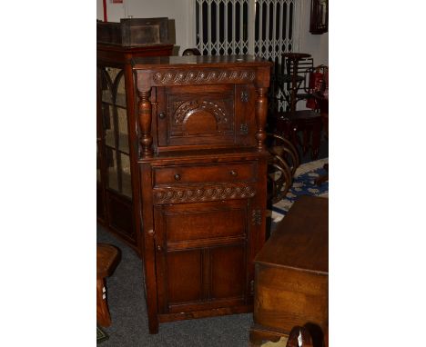 An unusually small Old Charm style oak buffet, c.1950