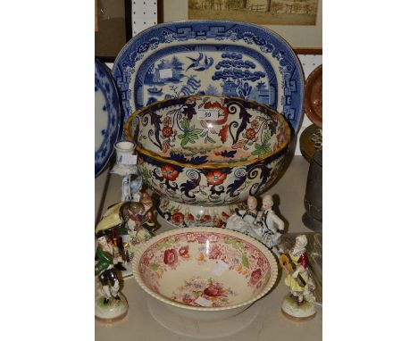 Ceramics - an Amhurst pedestal bowl, a Willow Pattern meat plate, a Sitzendorf figure, a blue and white figural candlestick; 