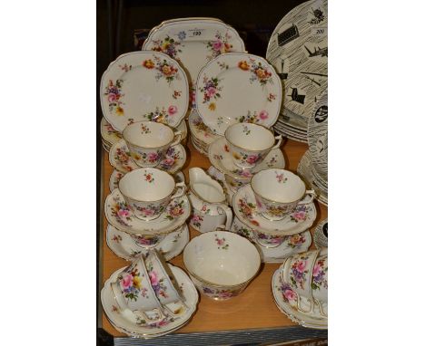 A Royal Crown Derby Derby Posies, edged in blue, pattern part tea service, consisting of bread and butter plates, cups and sa